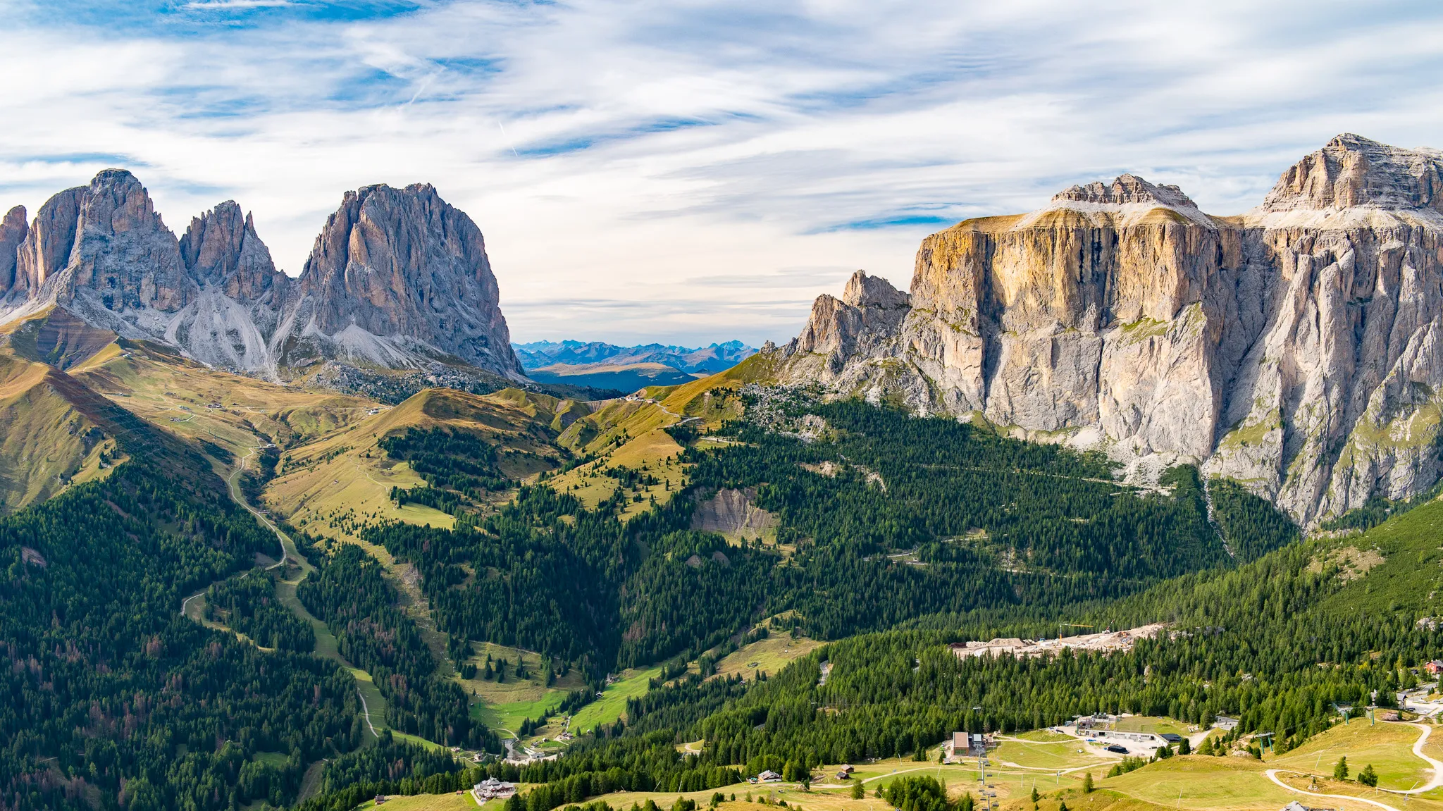 View from Col dei Rossi on Sassolungo (Langkofel) and Sass Pordoi (Pordoispitze) on a cloudy evening, Dolomites, Italy.
